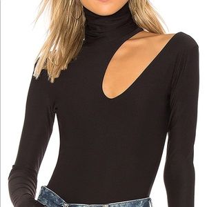 Turtle neck bodysuit with cut out